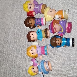 Eight little people figures